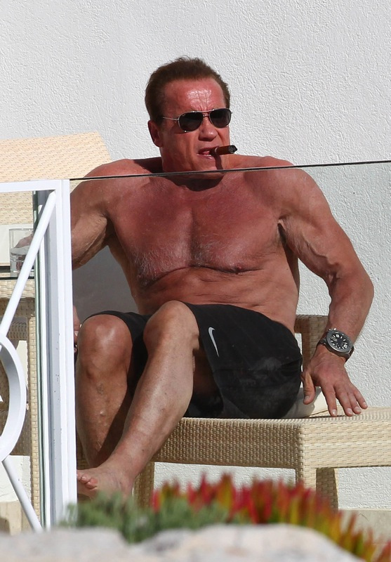Arnold Schwarzenegger sunbathing in Cannes